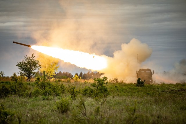 U.S. Soldiers assigned to the 1st Battalion, 14th Field Artillery Regiment, 41st Field Artillery Brigade, V corps, engage targets with a pair of high mobility artillery rocket systems (HIMARS) during Exercise Griffin Shock 23 live fire event in Bemowo Piskie, Poland, May 19, 2023. As the framework nation in Poland, Exercise Griffin Shock demonstrates the U.S. Army’s ability to assure the NATO alliance by rapidly reinforcing the NATO Battle Group Poland to a brigade size unit. (U.S. Army National Guard photo by Sgt. John Schoebel)