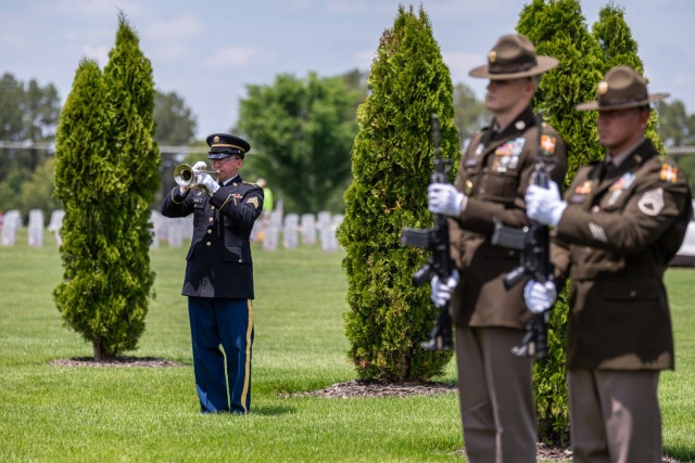 Sgt. Eric Trevino, with the 399th Army Band, performs “Taps” on Monday at a Memorial Day event held at the Missouri Veterans Cemetery – Fort Leonard Wood. 