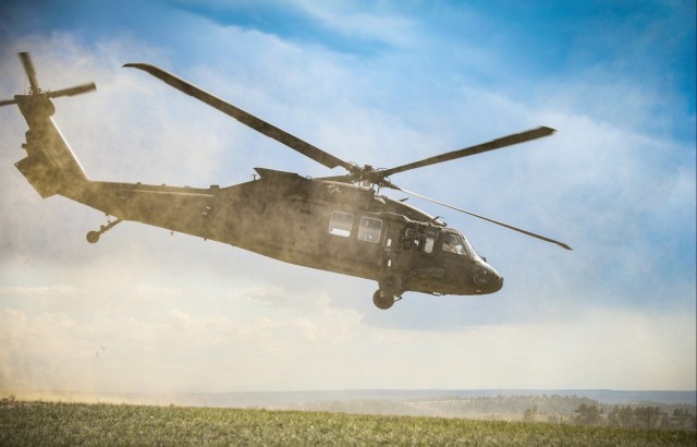 Iowa National Guard Black Hawk flies over Camp Guernsey