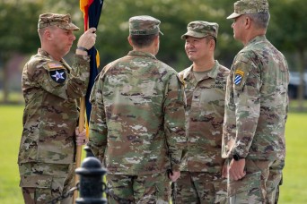 Raider Soldiers from the 1st Armored Brigade Combat Team, 3rd Infantry Division bid farewell to their commander, Col. Pete Moon during a change of comma...