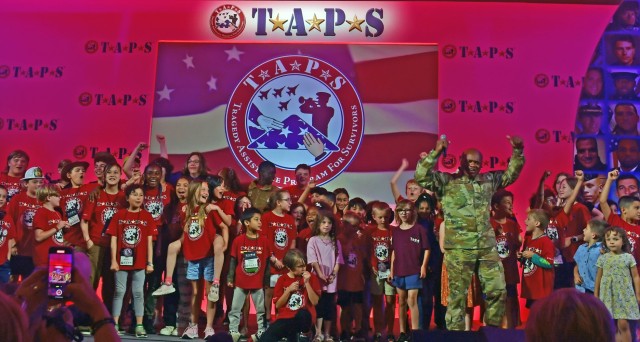 Senior Enlisted Advisor Tony L. Whitehead, SEA to the chief, National Guard Bureau, cheers with surviving military children during the Tragedy Assistance Program for Survivors’ 29th Annual National Military Survivor Seminar and Good Grief Camp,...