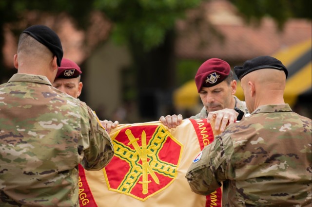 U.S. Army Lt. Gen. Christopher Donahue, commanding general of the XVIII Airborne Corps, wraps up the Fort Bragg garrison colors at Fort Liberty, N.C., June 2, 2023. “Liberty” was selected as the new designation for the base to represent every Soldier who has died fighting for American freedom. (U.S. Army photo by Sgt. Jameson Harris)