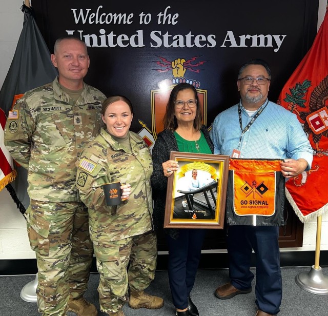 Team &#34;Red Hot Chili Steppers&#34; took first place in the U.S. Army Signal School &#34;Step by Step&#34; challenge with an overall total of 1,752,398 steps. From left to right: Sgt. Maj. Mark Schmitt, Maj. Melissa Manigault, Aurora Cantarella, and Tài Doick. Also on the team (but not pictured) is Laura Levering.