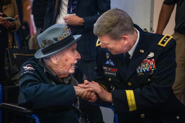 Maj. Gen. Jeff Broadwater, deputy commanding general, V Corps, talks with U.S. Army WWII veteran, and former V Corps Soldier, Jake Larson at a welcoming ceremony for 42 WWII veterans during D-Day 79 commemorations June 1, 2023, in Douville, France. While we will never know the countless acts of heroism that occurred on D-Day, we remain forever indebted to the “Greatest Generation” for their selfless service and sacrifice in defense of global peace and security.

(U.S. Army photo by, Spc. Joshua Zayas 4th Infantry Division)