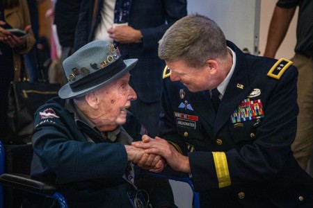 Maj. Gen. Jeff Broadwater, deputy commanding general, V Corps, talks with U.S. Army WWII veteran, and former V Corps Soldier, Jake Larson at a welcoming ceremony for 42 WWII veterans during D-Day 79 commemorations June 1, 2023, in Douville, France. While we will never know the countless acts of heroism that occurred on D-Day, we remain forever indebted to the “Greatest Generation” for their selfless service and sacrifice in defense of global peace and security.

(U.S. Army photo by, Spc. Joshua Zayas 4th Infantry Division)