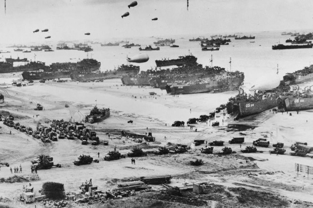 A bird&#39;s-eye view of landing craft, barrage balloons and Allied troops landing in Normandy, France, on D-Day, June 6, 1944.