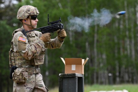 U.S. Army Pfc. Tyson Portwood, assigned to Palehorse Troop, 4th Squadron, 2nd Cavalry Regiment (2CR), fires a M320 grenade launcher at the 7th Army Training Command&#39;s Grafenwoehr Training Area, Germany, May 23, 2023. 2CR provides V Corps, America’s forward-deployed corps, with combat-credible forces capable of rapid deployment throughout the European theater to defend the NATO alliance. 
