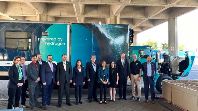 HON Jacobson (center) celebrates the unveiling of the H2 Emergency Vehicle with DOE, DHS and industry leaders who were part of the collaboration in the creation of the H2@Rescue Truck.