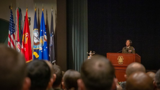 Chaplain (Major) LeyAnne P. Ward performs the National Anthem at graduation for Class 2023 of the Command and General Staff Officers Course. Ward and more than 1,000 of her classmates graduated June 9 at the Lewis and Clark Center.