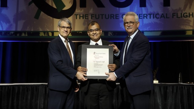 Dr. Rajneesh Singh, DEVCOM Army Research Laboratory, receives the VFS Technical Fellow award from outgoing Executive Director Mike Hirschberg (left) and Chair of the Board Tomasz Krysinski (Airbus) on May 18, 2023.
