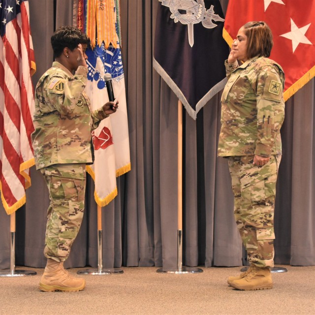 U.S. Army Lt. Gen. Donna W. Martin, left, the Inspector General, administers the inspector general oath of office to Sgt. Maj. Delia Quintero during the Worldwide Inspector General Conference at Camp Robinson, Arkansas, May 24, 2023. Quintero...