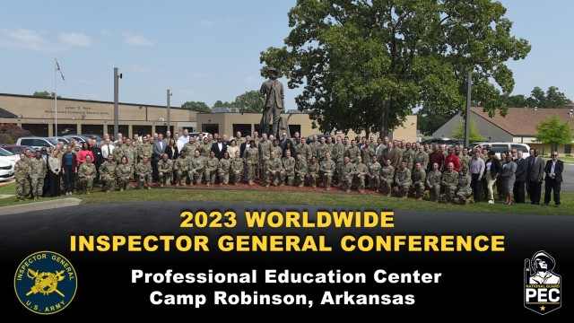 U.S. Soldiers and Army civilians stand for a group photo during the 2023 Worldwide Inspector general Conference at Camp Robinson, Arkansas, May 22, 2023. (U.S. Army photo by Timothy Johnsey)