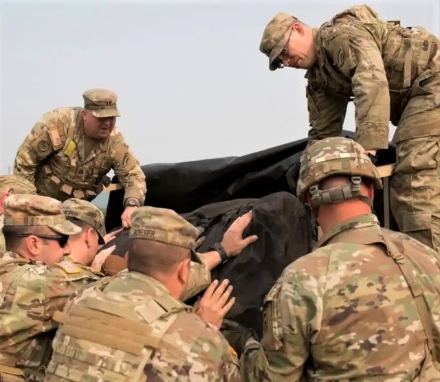 Soldiers from the 42nd Infantry Division conduct a command post movement commonly referred to as a jump June 9, 2023, during a Warfighter exercise at Fort Indiantown Gap, Pa. This movement allows Soldiers to practice their mobility skills to...