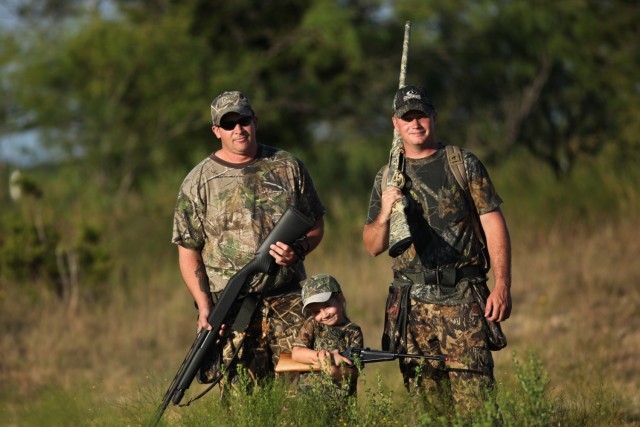 Dove hunters, decked out in camo, pursue mourning and white-winged doves in a Fort Cavazos training area. (U.S. Army photo by Christine Luciano, Fort Cavazos DPW Environmental)