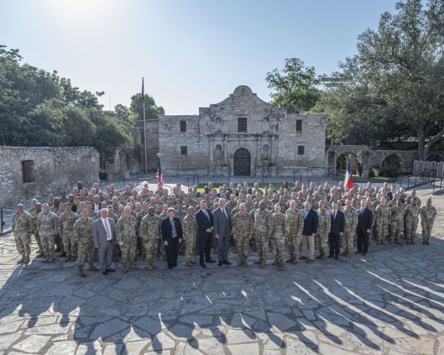 Participants in the IMCOM Garrison Command Team Conference in San Antonio pose in front of the Alamo on June 8, 2023.
