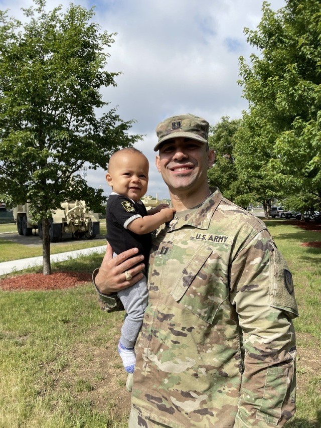 Capt. Baldwin poses with his son, Micah.
