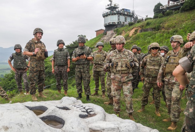 Command senior enlisted leaders with the Republic of Korea-U.S. Alliance gather around the ROK 3rd Infantry Division&#39;s White Skull in South Korea, on June 23, 2022. The CSELs participated in the 2nd Annual Keystone Seminar, a three-day event meant to bring the senior NCOs together to build esprit de corps and learn about Korean military history. (U.S. Army photo by Staff Sgt. Kris Bonet)