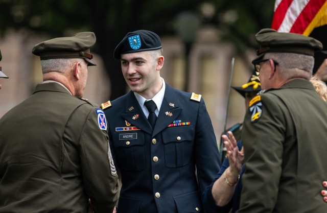 1st Lt. Adam Andre, a Soldier assigned to the Army Software Factory, shakes hands with Army senior leaders during an Army birthday celebration and cake-cutting ceremony hosted by Army Futures Command.