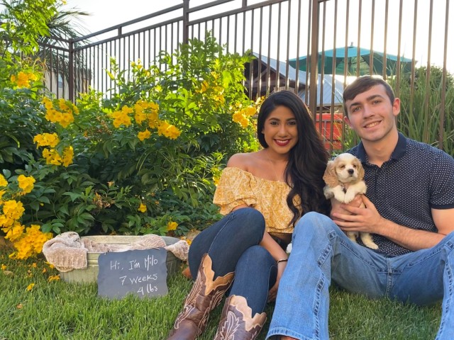 1st Lt. Adam Andre pictured in Texas with his wife, Carolina, and their new puppy, Milo. 