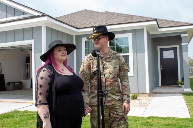 Allison and Spc. Grant Boshaw, 1st Air Cavalry Brigade, 1st Cavalry Division, speak following the ribbon-cutting ceremony June 16, 2023. They will be the first to receive a brand-new home in Heritage Heights at Fort Cavazos, Texas. (U.S. Army...