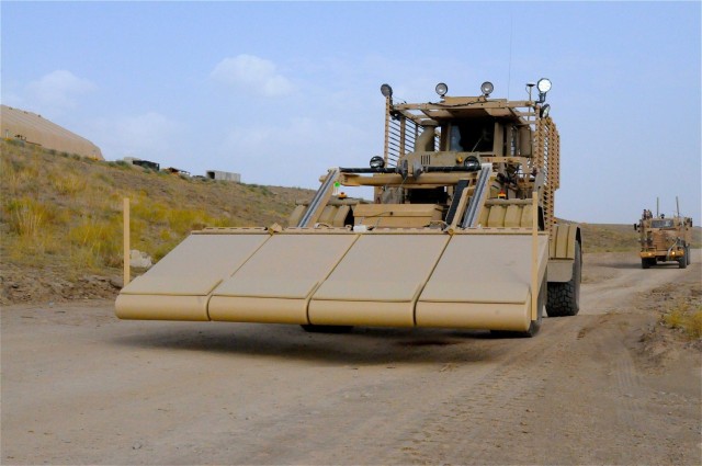 The Husky vehicle with ground penetrating radar panels gives Husky operators a three-dimensional picture of IED threats buried underground.  The development of this vehicle was a major program Stephen Kreider was responsible for during his tenure as the Program Executive Officer for Intelligence, Electronic Warfare & Sensors (2012-2016).