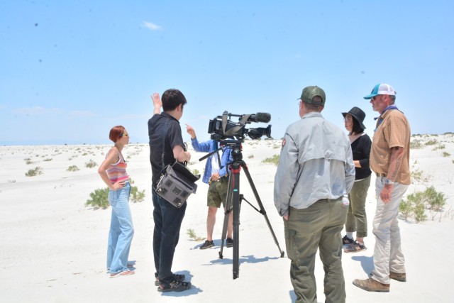 Japanese show films fossilized footprints at White Sands Missile Range
