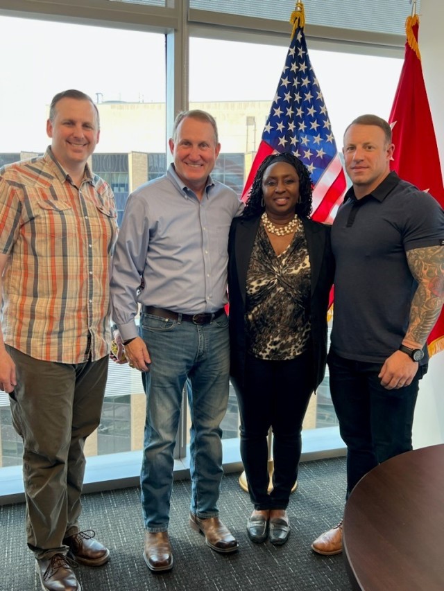 Lt. Gen. Thomas H. Todd III, center, with members of his staff – from left to right, Col. Ryan Nesrsta, Mrs. Joycelyn Taylor and Maj. Mark May – at Army Futures Command headquarters.