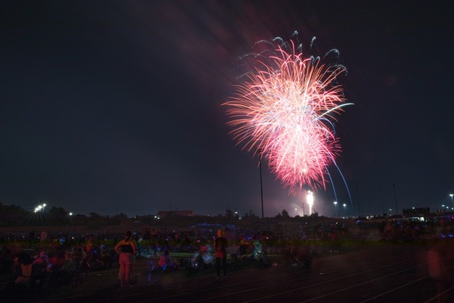 Thousands watch the 30-minute-long fireworks show at the end of Freedom Fest June 23, 2023, at Phantom Warrior Stadium on Fort Cavazos. The event was free and open to the public. During the event, attendees could browse around different vendor booths, choose between food trucks with different varieties of food and enjoy entertainment by Bowling for Soup, Tone Loc and Vanilla Ice. (U.S. Army photo by Blair Dupre, Fort Cavazos Public Affairs)