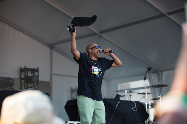 Tone Loc hypes up the crowd as he takes the stage during Freedom Fest June 23 on Fort Cavazos. He is known for his hits &#34;Wild Thing&#34; and &#34;Funky Cold Medina.&#34; (U.S. Army photo by Blair Dupre, Fort Cavazos Public Affairs)