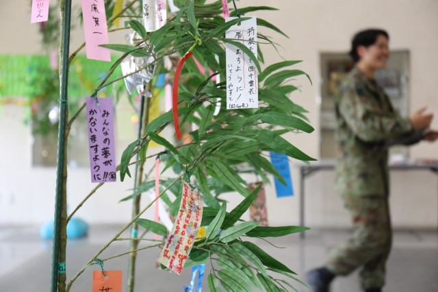 Strips of colorful paper with wishes written on them hang from small bamboo trees during an event to celebrate the &#34;Tanabata&#34; festival at Camp Zama, Japan, June 29, 2023. The Japan Ground Self-Defense Force&#39;s 4th Engineer Group hosted the event and invited community members to participate in the celebration. 