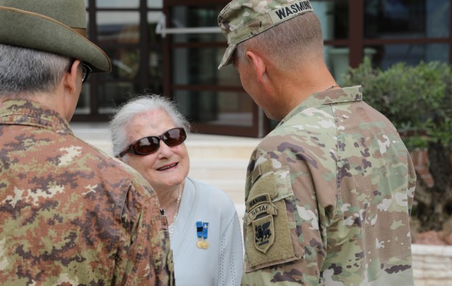 U.S. Army Maj. Gen. Todd R. Wasmund, commander of U.S. Army Southern European Task Force, Africa (SETAF-AF), right., welcomes guest of honor Ms. Paola Del Din at Caserma Del Din on Jun. 30, 2023. Members of the Vicenza military community, to...