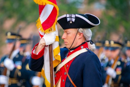 Soldiers assigned to the 3d U.S. Infantry Regiment (The Old Guard) and the U.S. Army Band &#34;Pershing&#39;s Own&#34;, perform the fifth Twilight Tattoo of the season, on Summerall Field, Fort Myer, Va, June 7, 2023. 