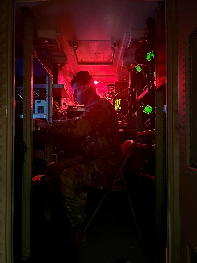 Spc. Connor Ridings, Kentucky National Guard, builds links on an Air Defense Systems Integrator to provide command and control data and track the activity of friendly and enemy forces within the airspace of the unit’s area of operations. The...