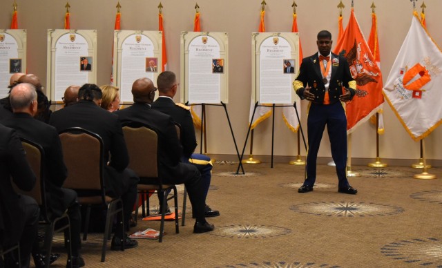  Regimental Command Sgt. Maj. Linwood Barrett delivers closing remarks for the Distinguished Members of the Regiment induction ceremony held June 24. 