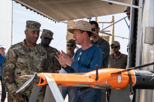 Maj. Gen. Sean Gainey (left), Director of the Army&#39;s Joint C-UAS Office (JCO), listens to a brief on the MORFIUS interceptor during JCOs&#39; most recent demonstration of the latest C-sUAS technology at U.S. Army Yuma Proving Ground (YPG) on June 8, 2023. The demonstrations are expected to continue for several more years, with each subsequent test focusing on different types of sUAS threats and C-sUAS systems.