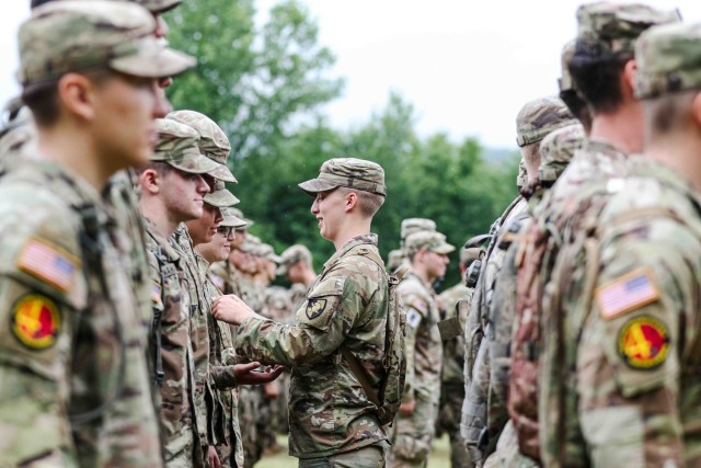 Staff and faculty gathered at Landing Zone Owl to commemorate the Class of 2026 Cadets as they moved up in rank from plebes to yearlings during the Cadet Field Training graduation on June 27 at Camp Buckner. Photo by Jorge Garcia/ USMA PAO.
