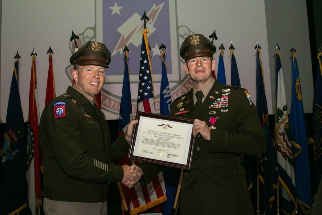 ISEC passes guidon to new commander