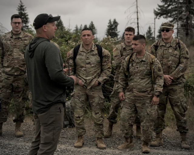 U. S. Soldiers with 56th Theater Information Operation Group, Washington Army National Guard, receive a safety brief at Joint Base Lewis-Mccord July 8, 2023.