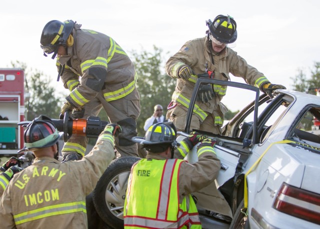 Department of Emergency Services and various agencies from neighboring Central Texas communities work to rescue trapped passengers in a simulated a two-vehicle accident July 11 on Fort Cavazos. (U.S. Army photo by Scott Darling, Fort Cavazos...