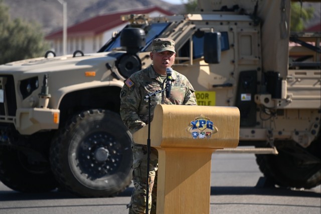 Command Sgt. Maj. Mark Millare delivers prepared remarks moments after assuming responsibility as the highest-ranking enlisted Soldier at U.S. Army Yuma Proving Ground on July 13, 2023. “I recognize the profound responsibility that comes with...
