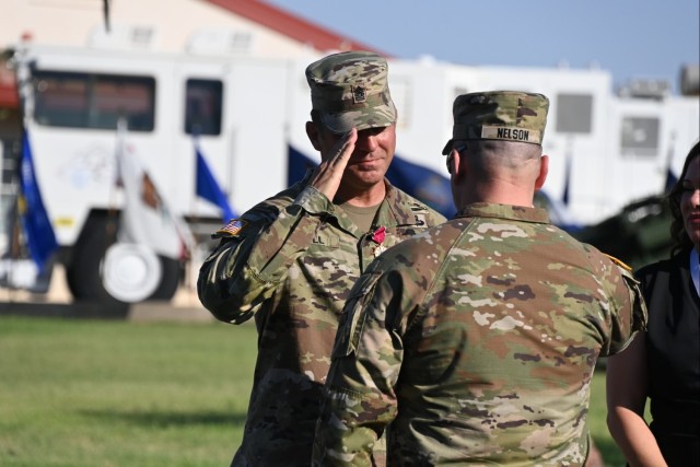 Outgoing U.S. Army Yuma Proving Ground Command Sgt. Maj. Herbert Gill salutes post commander Col. John Nelson after receiving the Legion of Merit on July 13, 2023. Command Sgt. Maj. Mark Millare assumed responsibility as the post&#39;s senior...