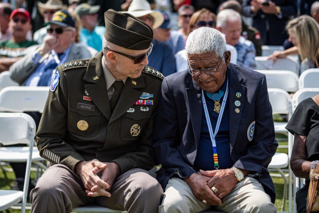 Vice Chief of Staff of the U.S. Army, Gen. Randy George speaks with Medal of Honor Recipient Mr. Melvin Morris during the opening ceremony for the Vietnam Veterans “Welcome Home” Celebration at the west end of JFK Hockey Fields on the National Mall in Washington, D.C., May 11, 2023. Vietnam veterans and their families were honored during the commemoration of the 50th anniversary of the Vietnam War. 