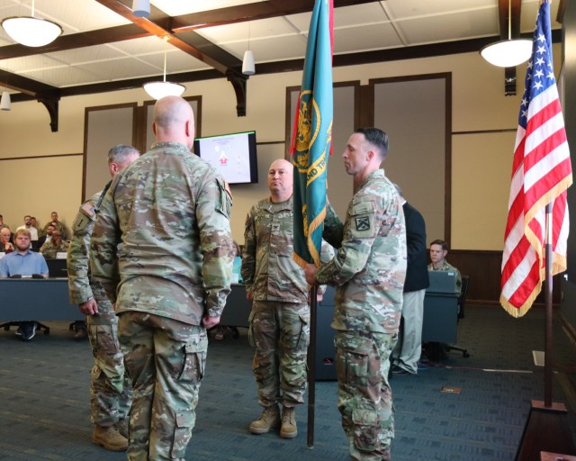 MCTP leadership prepare for the passing of the colors signifying the relinquishing of command from Col. Bryan L. Babich to the 21st commander of the MCTP, Col. Richard J. Ikena, Jr. during the change of command ceremony July 14, 2023 at McHugh Training Center, Fort Leavenworth, Kan.  Photo by Maj. Christopher Hart, Mission Command Training Program Public Affairs