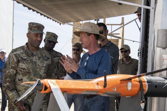 Maj. Gen. Sean Gainey (left), Director of the Army&#39;s Joint C-UAS Office (JCO), listens to a brief on the MORFIUS interceptor during JCOs&#39; most recent demonstration of the latest C-sUAS technology at U.S. Army Yuma Proving Ground (YPG) on June 8, 2023. The demonstrations are expected to continue for several more years, with each subsequent test focusing on different types of sUAS threats and C-sUAS systems.