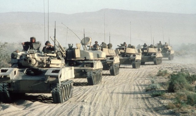 M551 Sheridan light tanks cross the desert during an Opposing Forces exercise at the National Training Center in Fort Irwin, California. The tanks have visual modifications designed to make them resemble Soviet armor, 1986.

