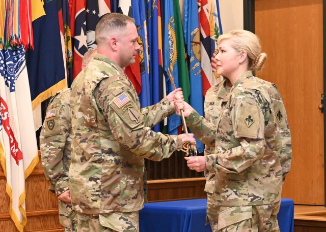 The U.S. Army Chemical, Biological, Radiological and Nuclear School held a change-of-responsibility ceremony Tuesday in Lincoln Hall Auditorium, where Regimental Chief Warrant Officer 4 Humphrey Hills relinquished responsibility to Regimental Chief Warrant Officer 4 Matthew Chrisman. 