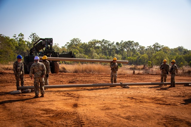 Soldiers connect the last section of pipeline during Exercise Talisman Sabre 23 in Weipa, Australia, July 20, 2023. The soldiers work on the joint petroleum over-the-shore operation, which demonstrates a critical logistics capability in the Indo-Pacific region.