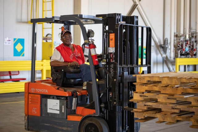 Curtis Haynes, a forklift operator with the Army Field Support Battalion-Cavazos Subsistence Supply Management Office, takes a moment as he operates a forklift in the warehouse. He is one of many employees who will be impacted by the 4.75 percent pay increase. “I think overall it’s fair because they’re putting us in the same pay scale as Waco,” he shared. “I think we’re pretty much on the same level as everybody else here in Central Texas.” (US Army photo by Samantha Harms, Fort Cavazos Public Affairs)