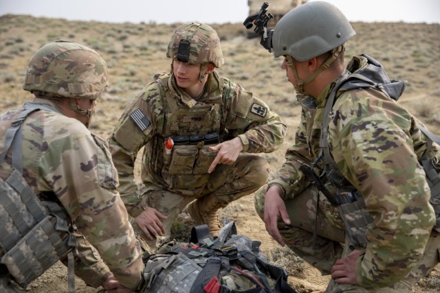U.S. Army National Guard Infantrymen from Delta Company, 1st Battalion, 297th Infantry Regiment, perform tactical combat casualty care while conducting berm drills during training exercises in Lovell, Wyo., May 18, 2023.
(U.S. Army National Guard Photo by Pvt. Joseph Burns)