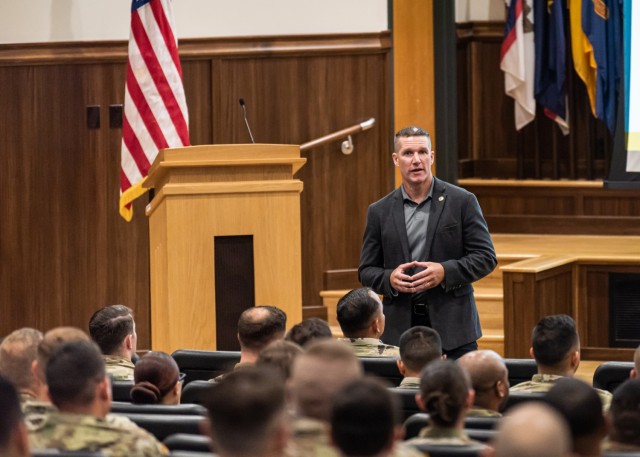 Retired Sgt. Maj. Daniel Dailey, the 15th Sergeant Major of the Army, who currently serves with the Association of the U.S. Army, speaks to NCOs about leadership Tuesday in Lincoln Hall Auditorium during a visit this week to Fort Leonard Wood. 